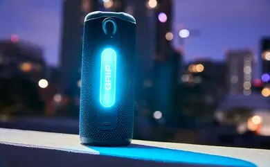 JBL Grip speaker featuring Auracast support for multi-speaker pairing.