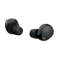 Close-up of Sony WF-1000XM5 earbuds in-ear showing ergonomic design and comfortable fit.
